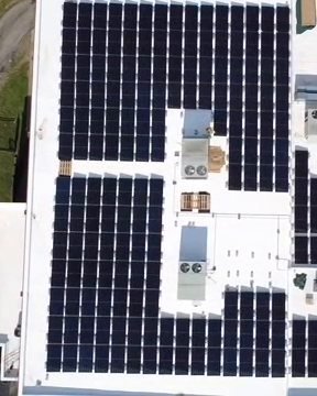 Commercial flat roof covered with solar panels