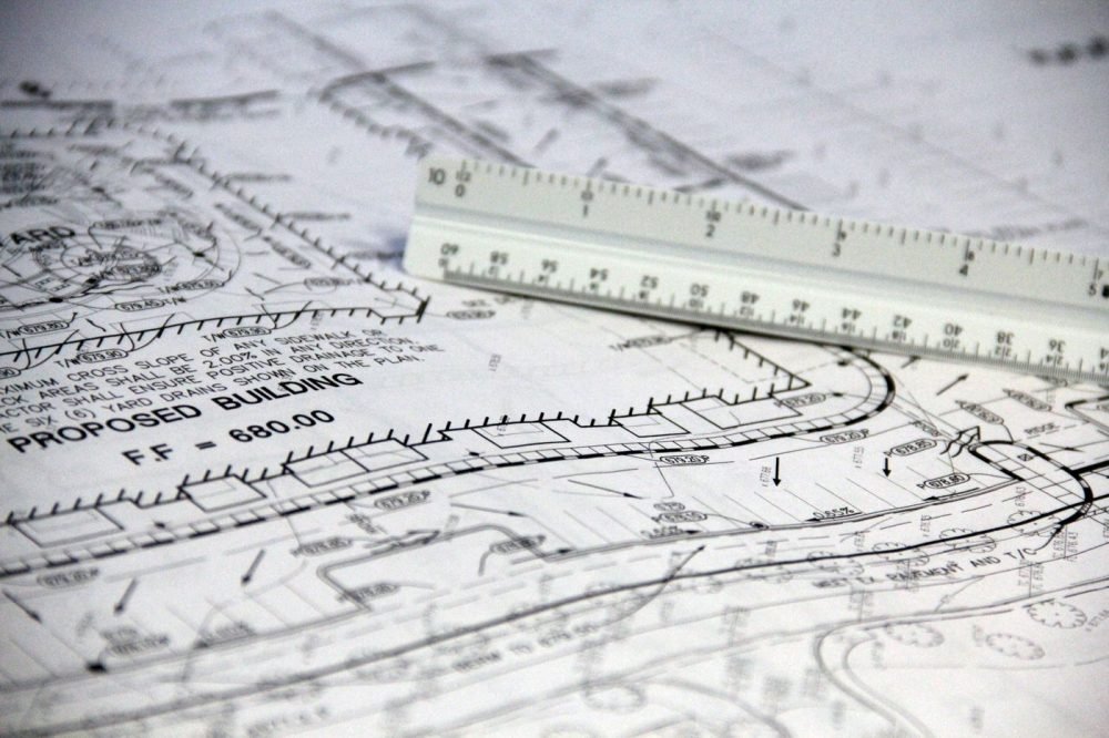 Electrical design drawings and scale ruler for an energy system layout